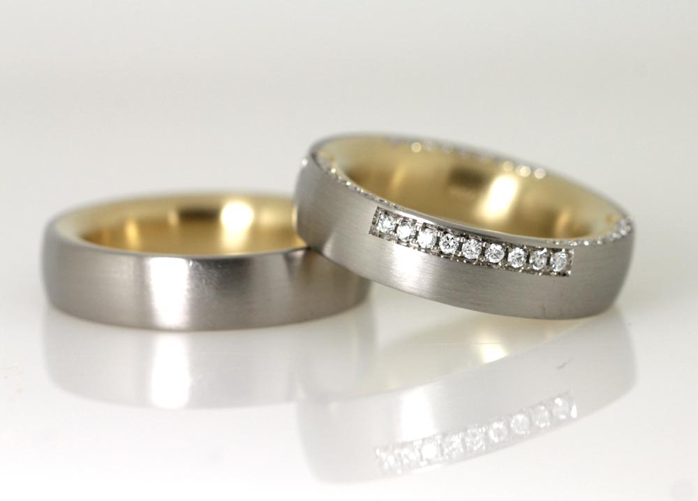 Production of wedding rings in Schmuckgarten - plug-in solder rings - punching out - women's ring with diamonds