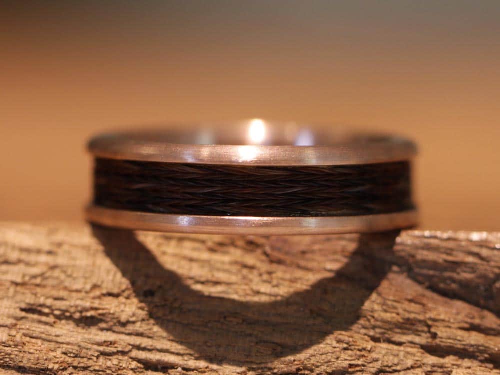 precious red gold ring with woven horse hair