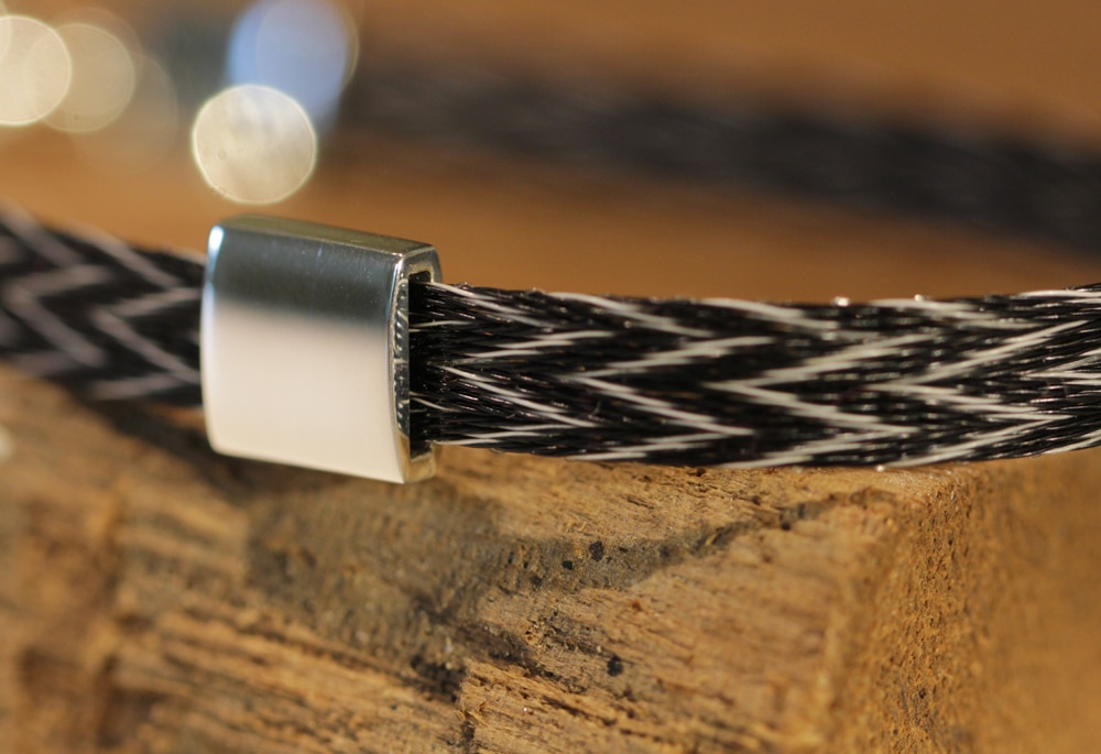 Horsehair bracelet with two silver elements and silver clasp