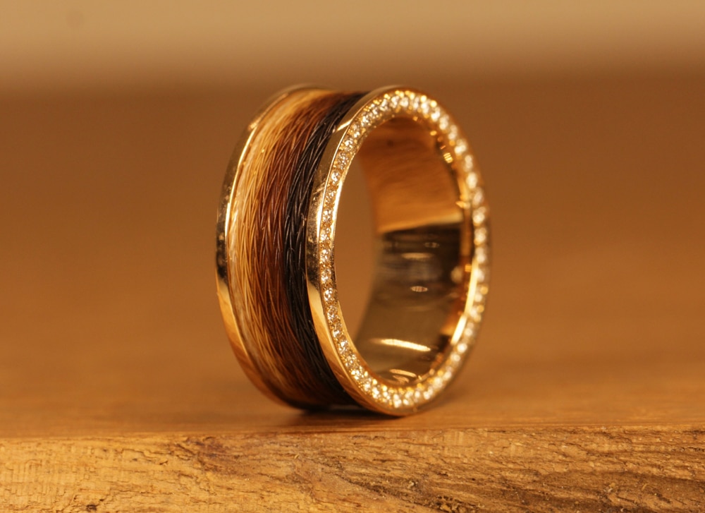 Horse hair jewelry - gold ring with brilliants set on the side and woven horse hair