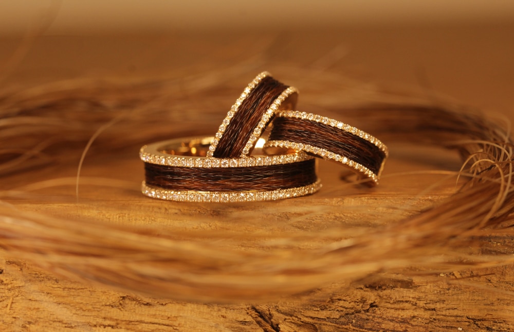 jewelry set made of yellow gold with woven horse hair and diamonds - ring and hoop earrings