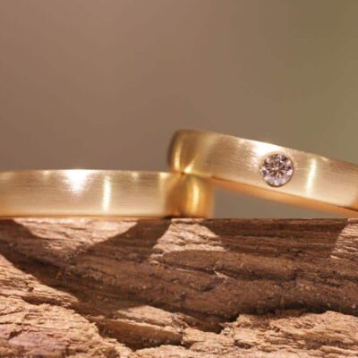 oval matte yellow gold wedding rings with brilliant