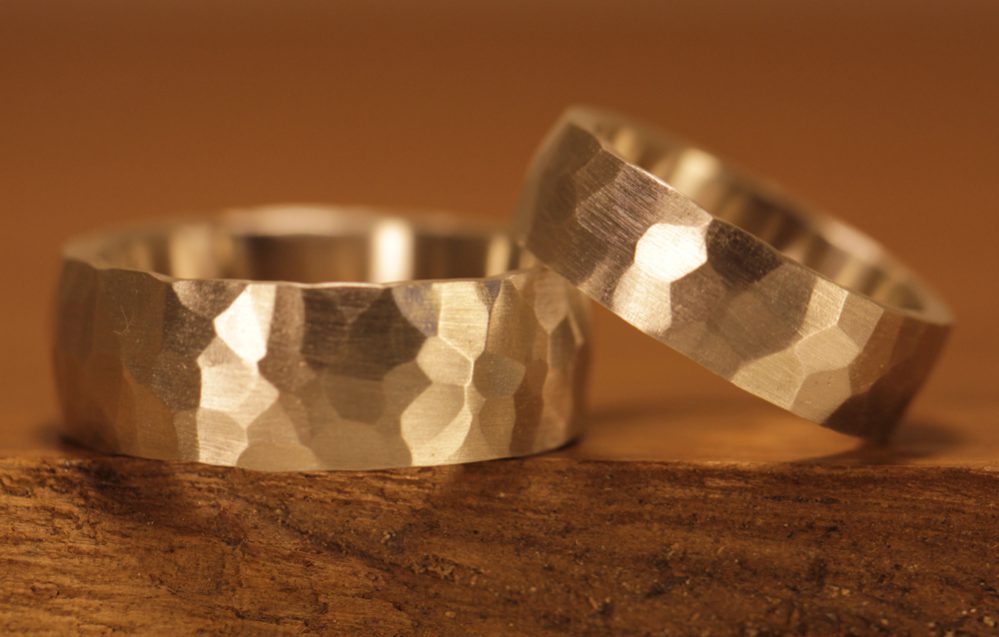 beautiful wide silver wedding rings, surface hammered with the web