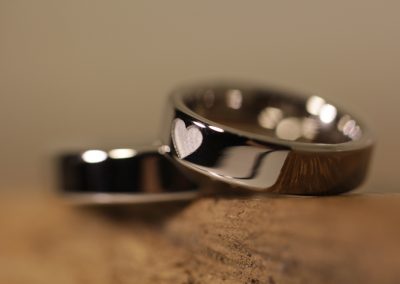 outside heart engraving in platinum wedding rings