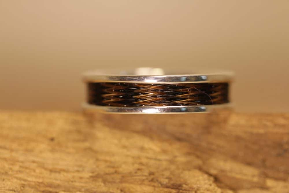 Silver ring with woven horse hair