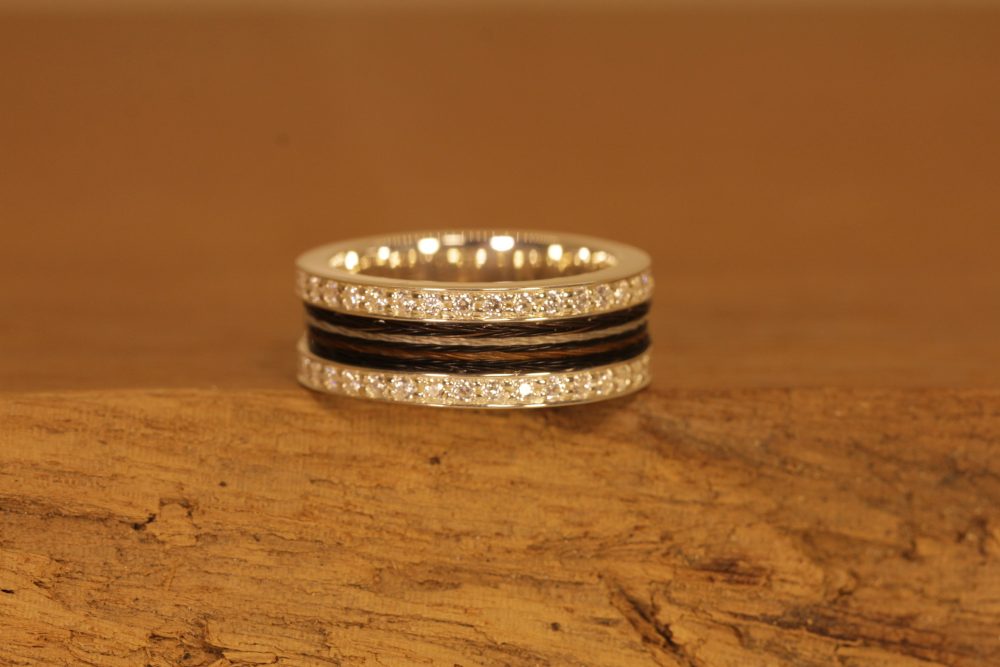 Wide silver ring with zirconia and horse hair