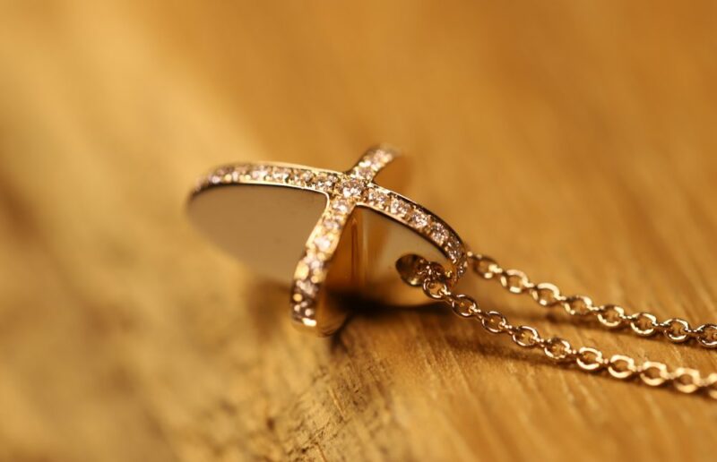 Rose gold cross with brilliants