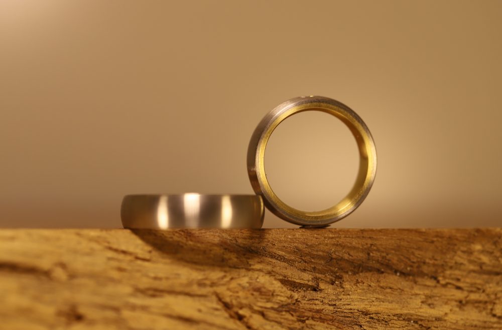 Wedding rings Two-tone soldering rings 950 palladium and 750 yellow gold with brilliant