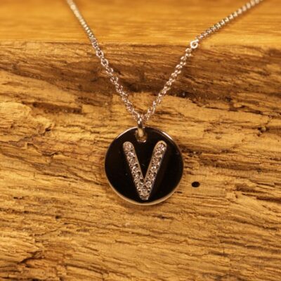 Pendant in 585 gray gold with a V in diamonds
