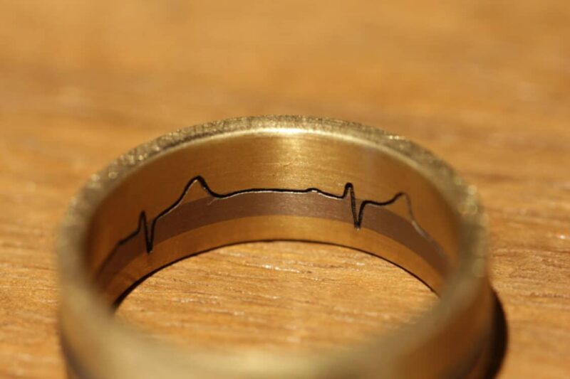 Wedding ring with ekg line as engraving inside the ring