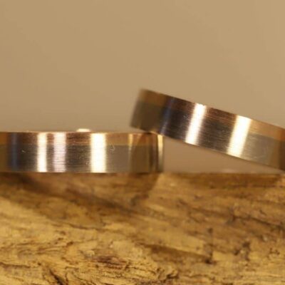 Edged wedding rings disc rings 585 gray gold with red gold