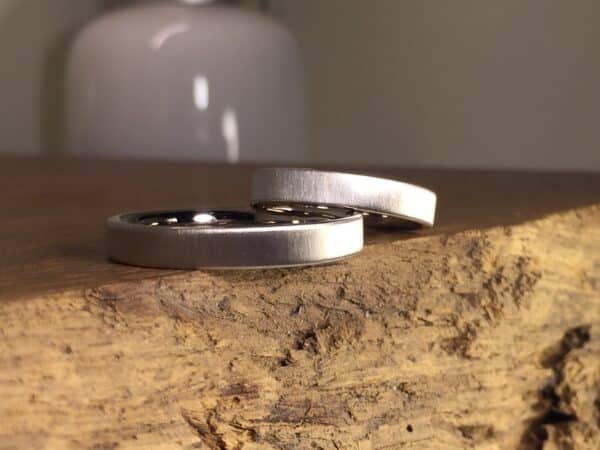 Rocky wedding rings made of 585 gray gold on the outside, matt polished on the inside