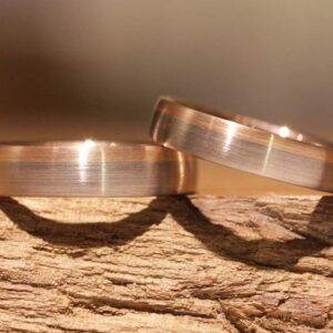 Two-tone wedding rings Disc rings in 585 gray gold and narrow red gold
