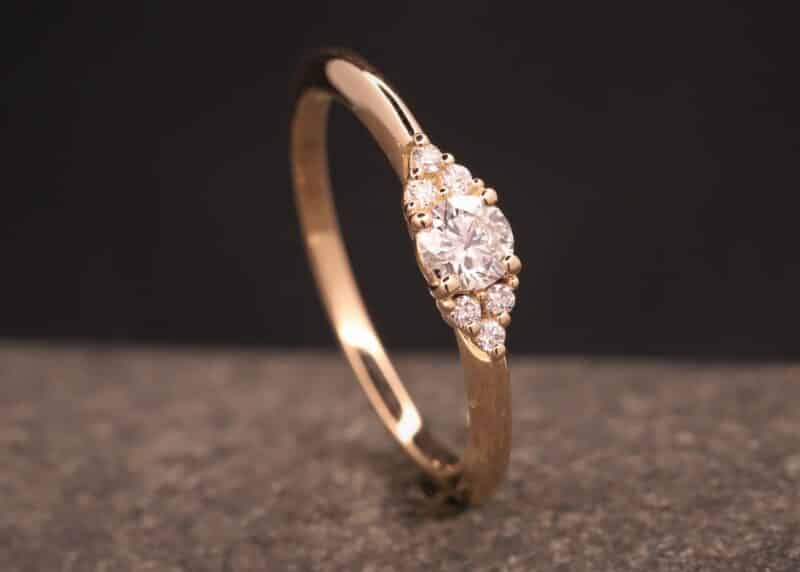Engagement ring rose gold with multiple synthetic diamonds Schmuckgarten