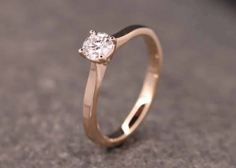 engagement ring in gold with a brilliant in a 4 claw setting schmuckgarten stolberg